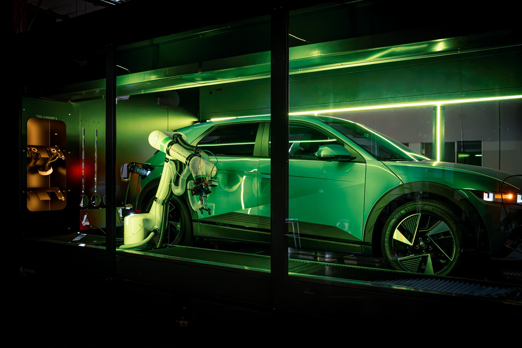 Robot arm beside vehicle